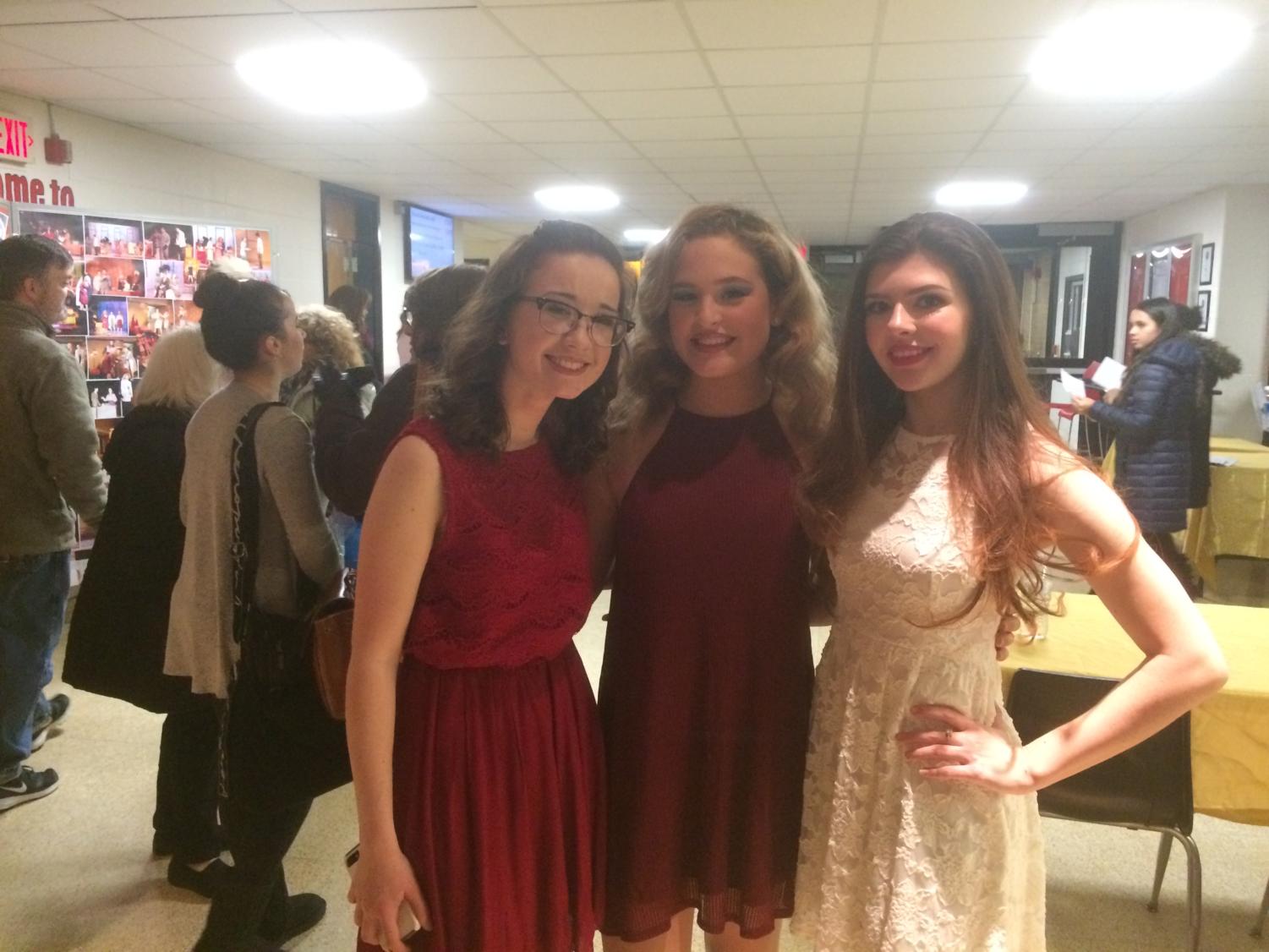 Pictured from left to right are Emily Burns, Caroline Seretis, and Julia Botvinov who play the roles of three powerful women who aim to undermine their sexist boss for justice.